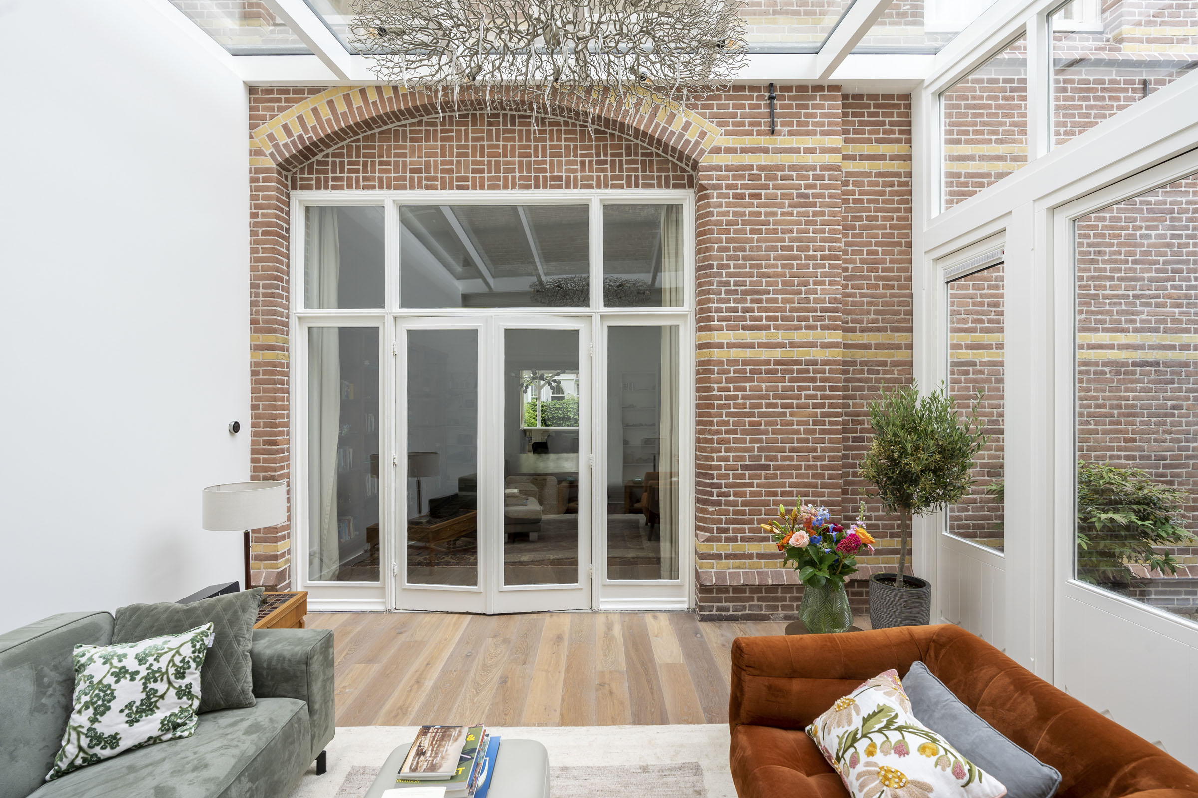 glazen aanbouw bij herenhuis