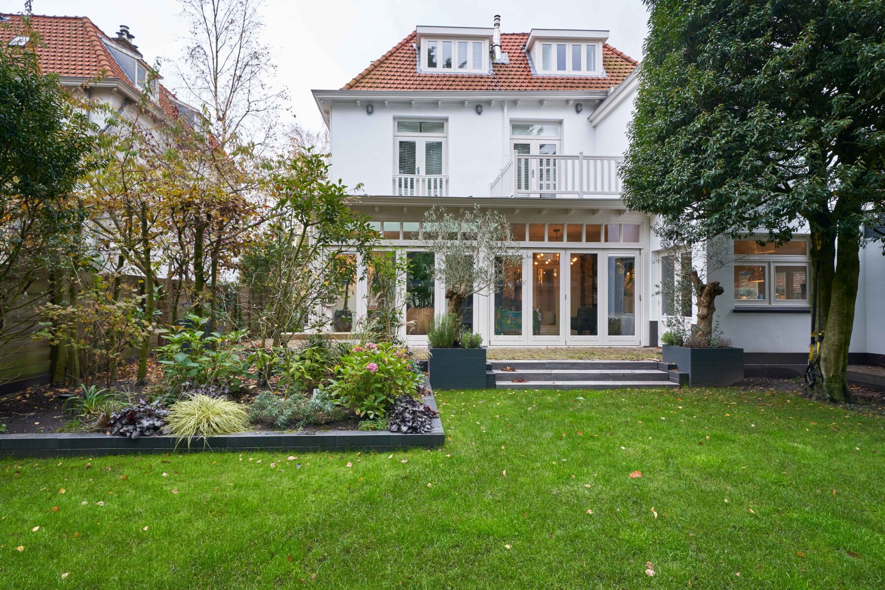 Klassieke serre met harmonicadeuren te Bloemendaal