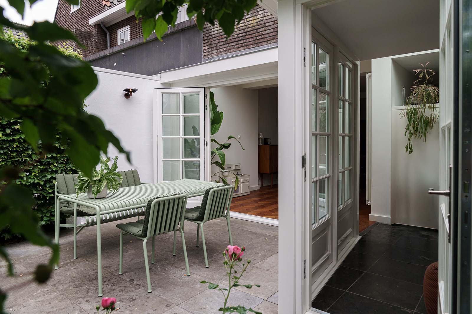 Klassieke uitbouw met openslaande deuren