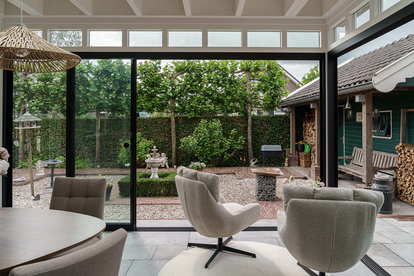 Tuinkamer met glazen schuifwanden in Nieuwkoop