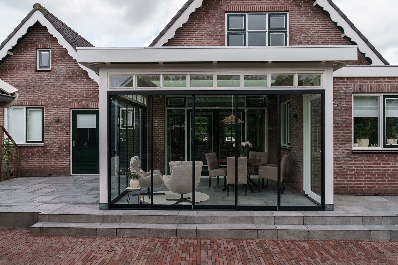 Klassieke tuinkamer met steellook schuifwanden